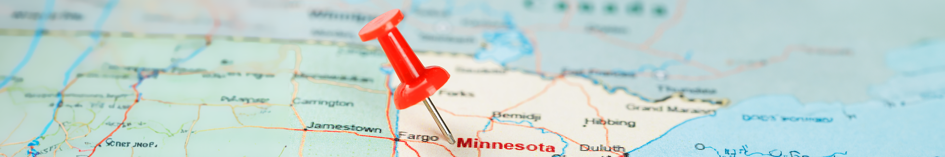 image of a map of Minnesota with a pushpin at Minnesota